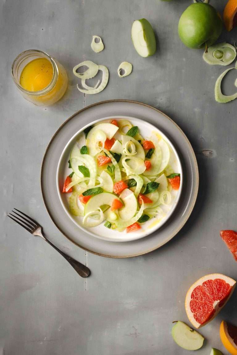 Fennel and apple carpaccio on a plate.