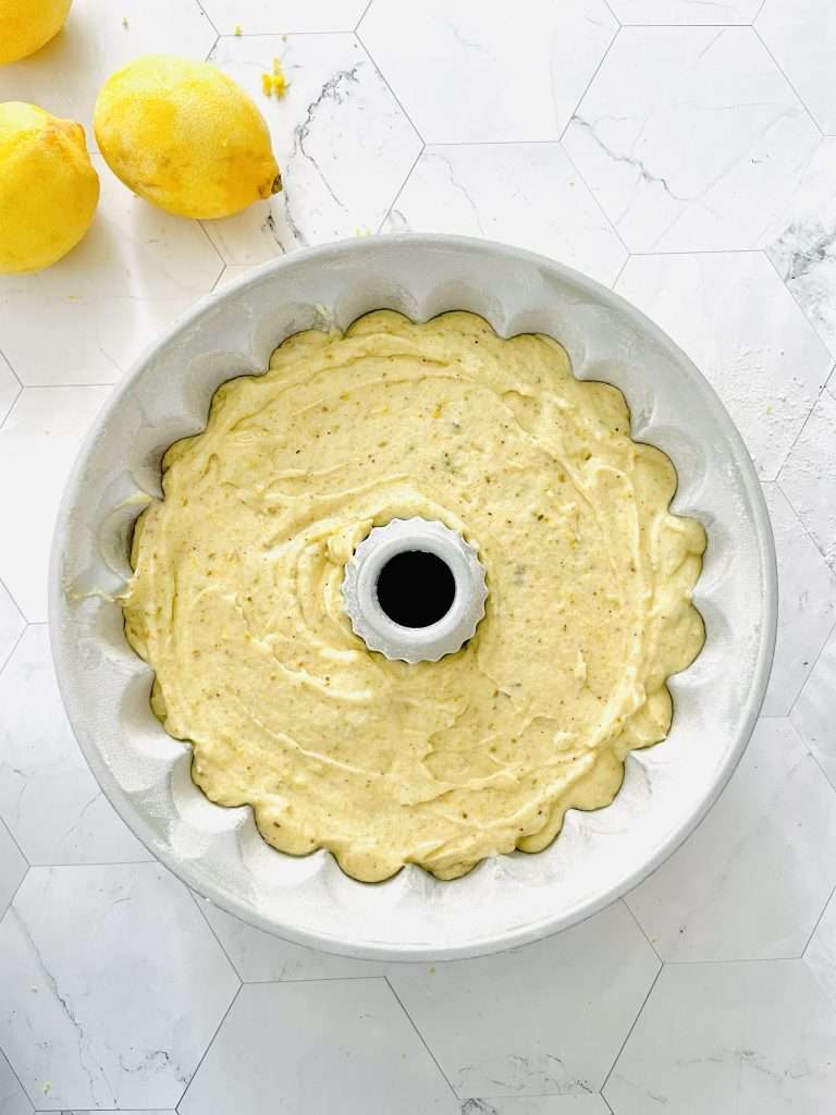 Lemon Pistachio Cake with Cream Cheese Frosting 17 Lemon pistachio cake batter in a bundt pan.