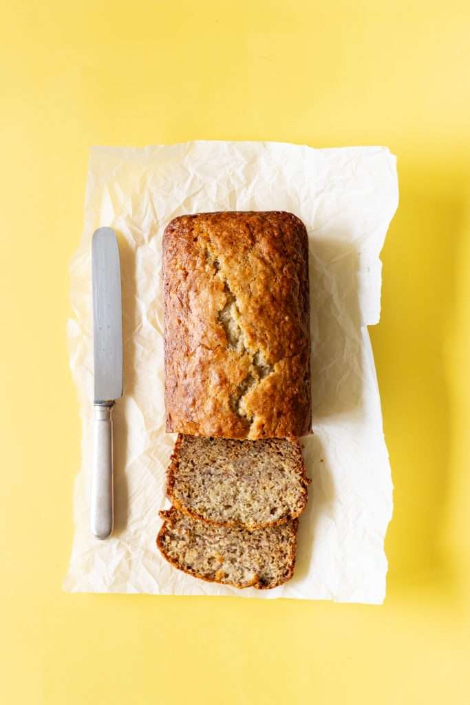 banana bread with yogurt on parchment paper