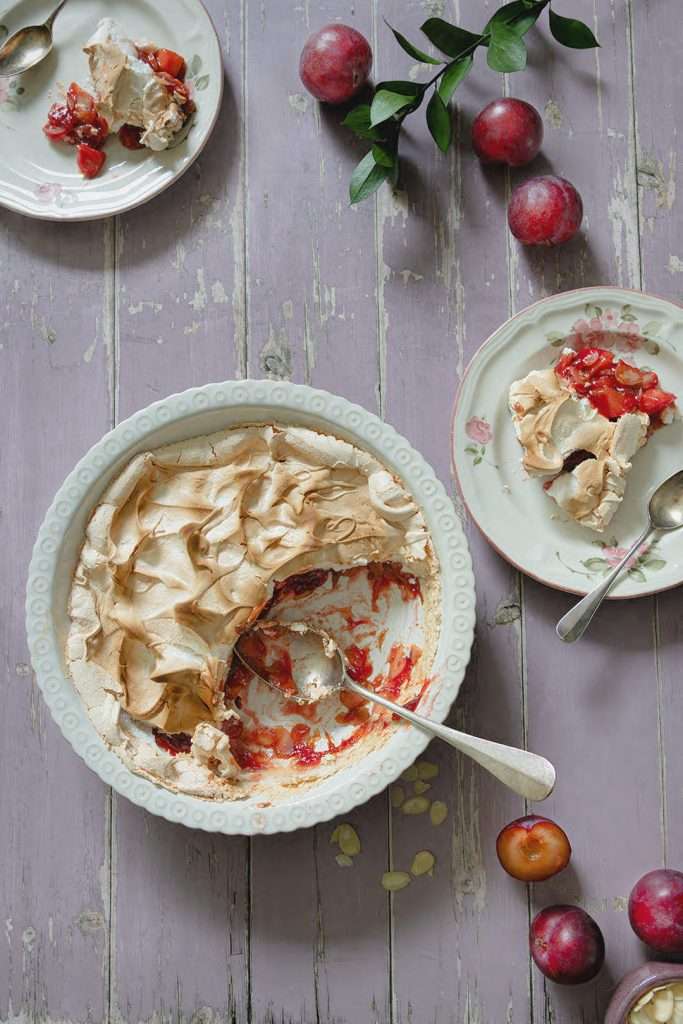 Swiss Plum Meringue (Zwetschgen) with Toasted Almond Base 13 Served Swiss plum meringue dessert.