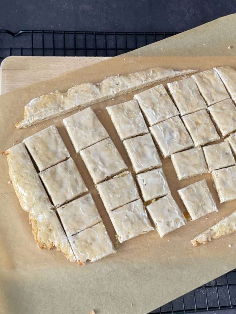 Basler Läckerli (Traditional Swiss Honey Spice Cookies) 21 Basler Lakerli cut into squares.