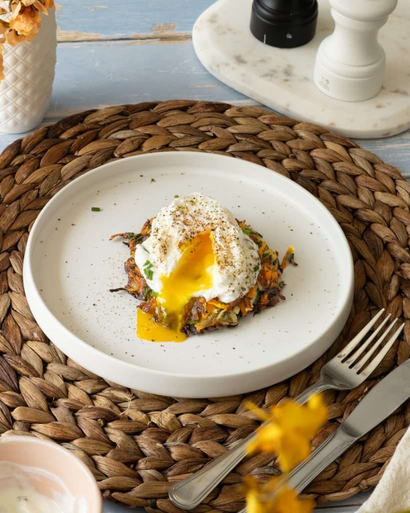 Carrot and potato rosti with lemon yogurt and a poached egg ontop a different type of Swiss breakfast idea.