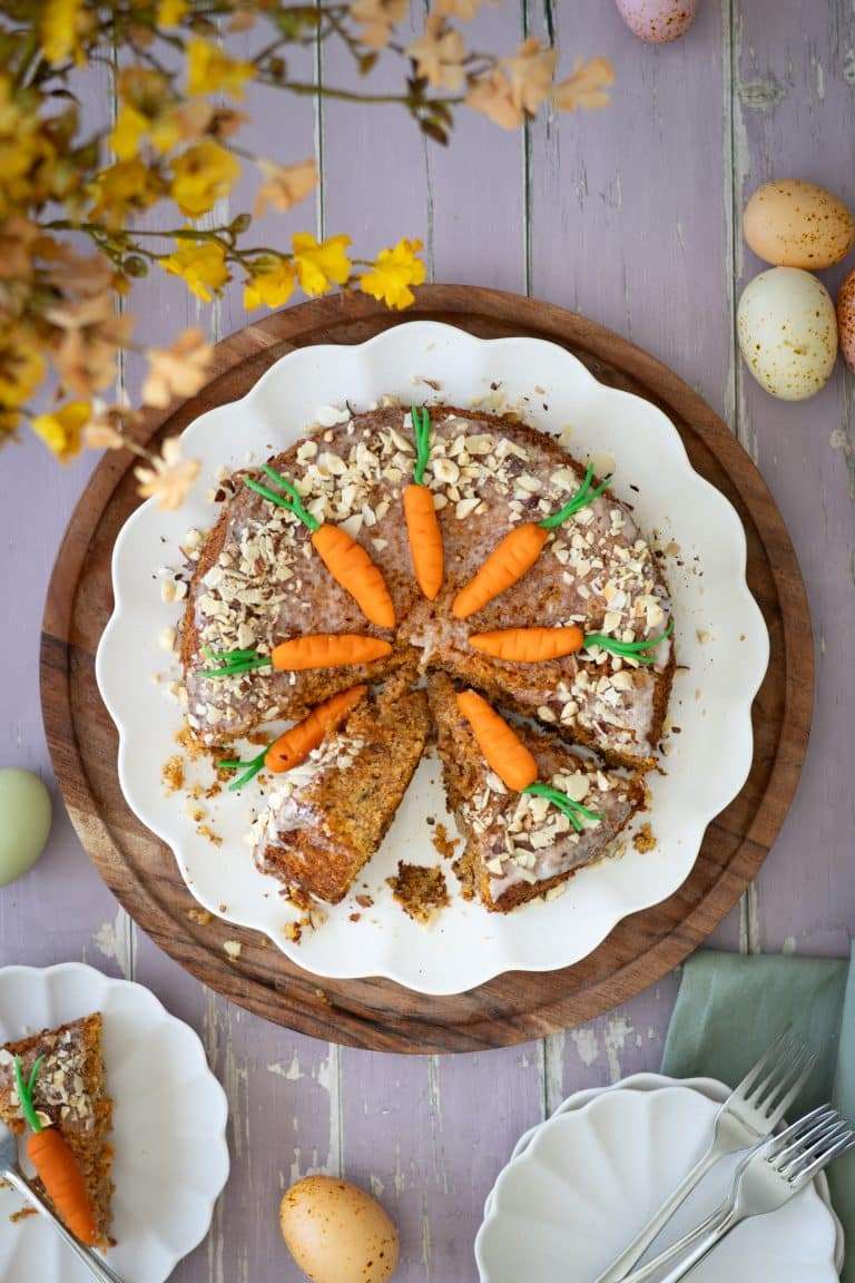 Swiss carrot cake with a few slices sliced.