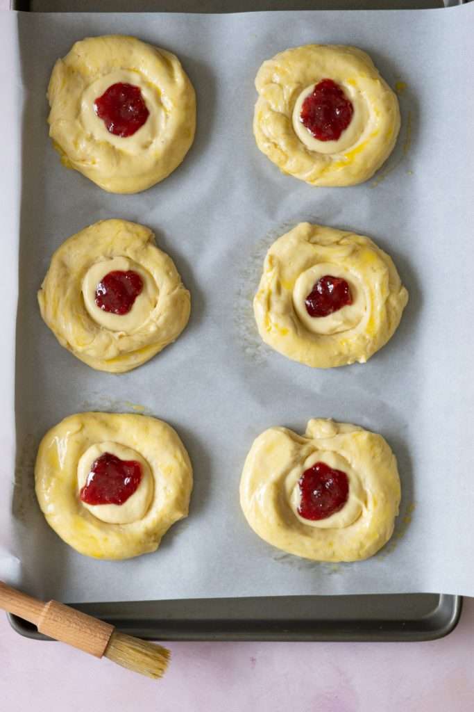 Strawberry Rhubarb Brioche Buns with Baked Vanilla Cream 31 Brioce buns brushed with egg wash before baking.