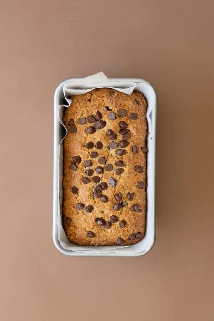 Baked chocolate hazelnut loaf in the loaf pan.
