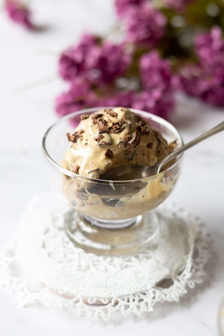Homemade coffee ice cream with chocolate pieces.