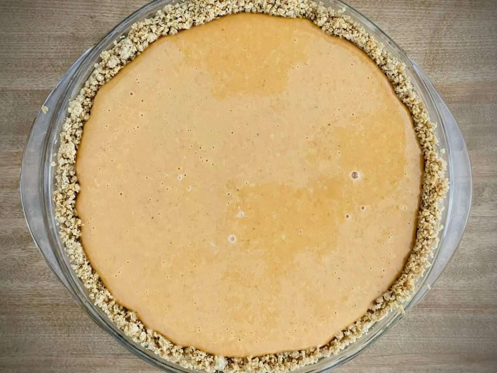 Classic Pumpkin Pie with Graham Cracker Crust 11 Pumpkin pie filling poured into the prepared graham crust.