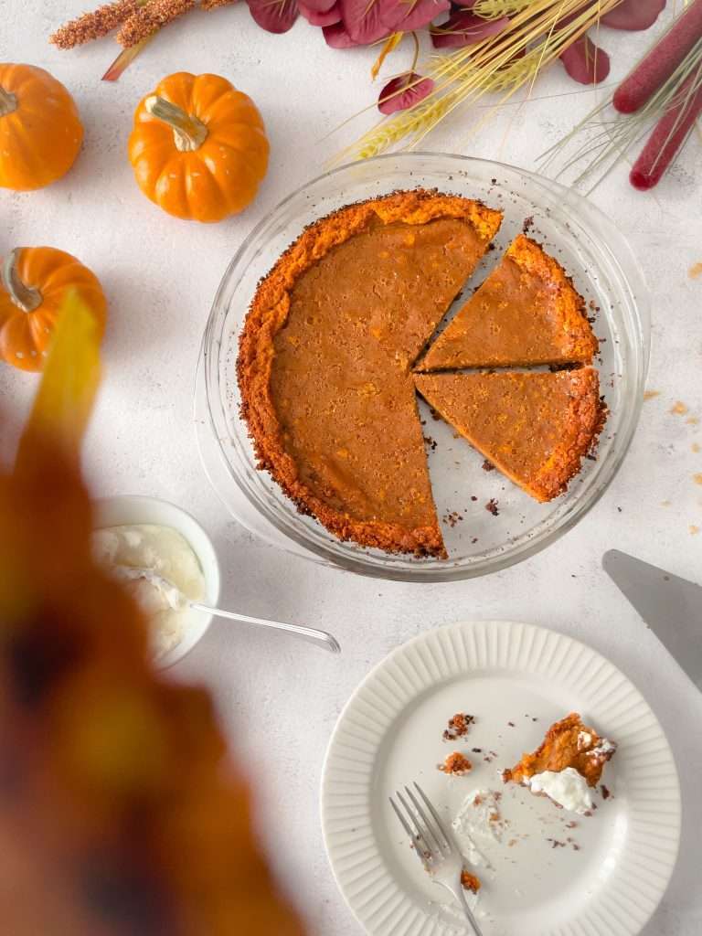 Classic Pumpkin Pie with Graham Cracker Crust 1 Classic pumpkin pie served with an autumn themed table.